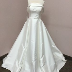 Simple off-the-shoulder Essense of Australia Wedding Gown